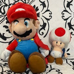 Mario plush backpack and Toad doll
